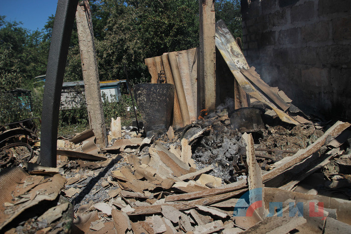 Последствия обстрела села Желобок киевскими силовиками, 18 июня 2018 года